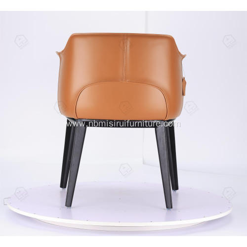 Italian minimalist orange leather single Archibald chairs